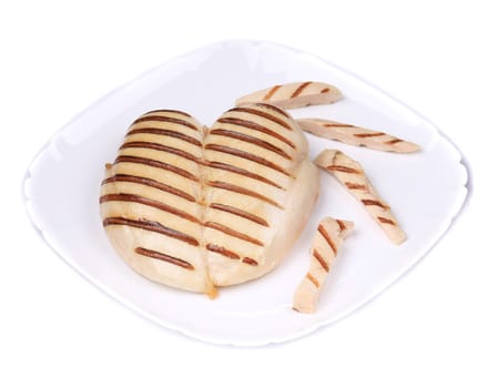 Chicken grilled fillet with slices on plate. Isolated on a white background.