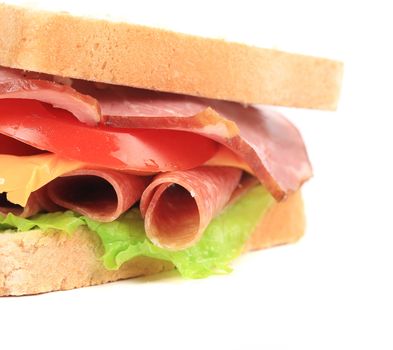 Sandwich with bacon and vegetables. Whole background.
