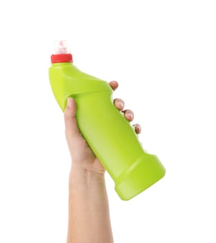 Hand holding green bottle. Isolated on a white background.