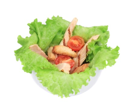 Caesar salad with tomatoes cherry. Isolated on a white background.