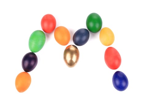 Letter M from the eggs for easter. Isolated on a white background.