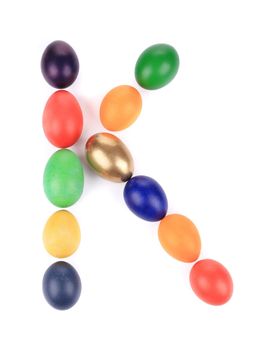 Letter K from the eggs for easter. Isolated on a white background.