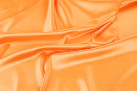 Bright orange satin. To be used as background.