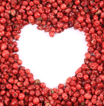 Heart in red pepper. To be used as background.