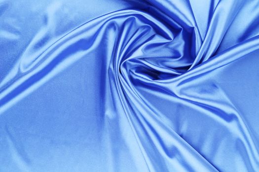 Smooth elegant blue silk. To be used as background.