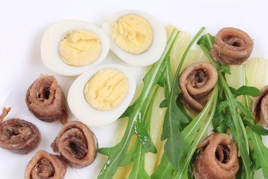 Salad with anchovies and asparagus. To be used as background.