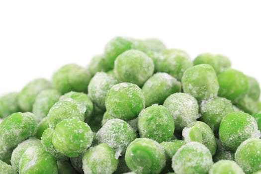 Close up of frozen green peas. Whole background.