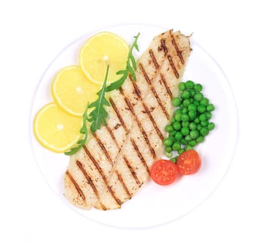 Pangasius fillet on plate. Isolated on a white background.