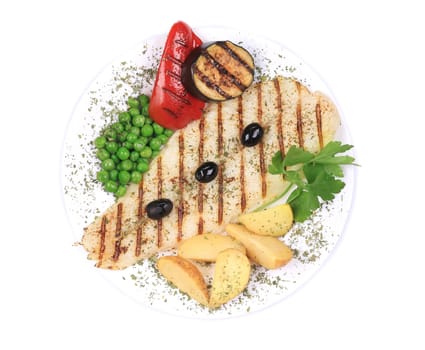 Pangasius fillet grilled with vegetables. Whole background.