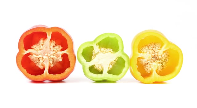 Three half of bell peppers. Isolated on a white background.