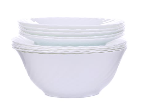 Empty plates isolated on a white. Isolated on a white background.