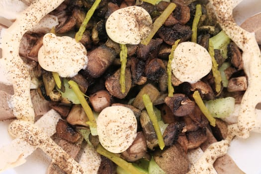 Meat salad with mushrooms. Close up. Whole background.