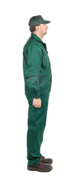 Man in green workwear. Isolated on a white background.