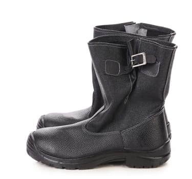 Black kersey pair of boots close up. Isolated on white background.