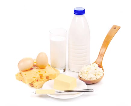 Cheese eggs and milk glass. Isolated on a white background.