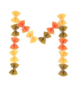 Letter M from the colorful pasta. Isolated on a white background.