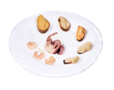 Delicious seafood on a plate. Isolated on a white background.