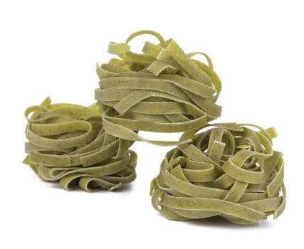 Tagliatelle paglia italian pasta. Isolated on a white background.