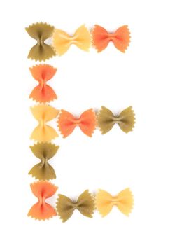 Letter E from the colorful pasta. Isolated on a white background.