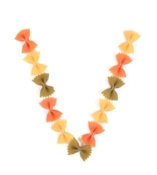 Letter V from the colorful pasta. Isolated on a white background.