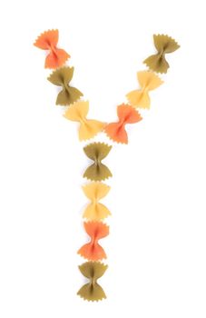 Letter Y from the colorful pasta. Isolated on a white background.