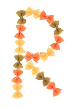 Letter R from the colorful pasta. Isolated on a white background.