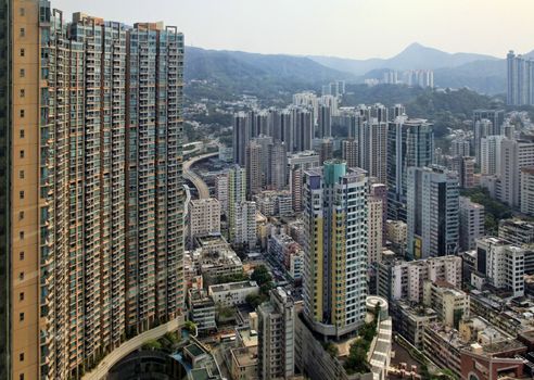 HONG KONG, CHINA - MARCH 28: Residential building in Hong Kong, March 28, 2012. The city is one of the most populated areas in the world.     