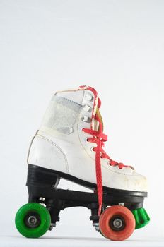 Used Vintage Consumed Roller Skate on a White Background