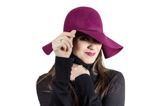 Portrait of beautiful young girl with a garnet hat in her head, isolated on white background