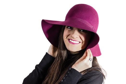 Portrait of beautiful young girl with a garnet hat in her head, isolated on white background