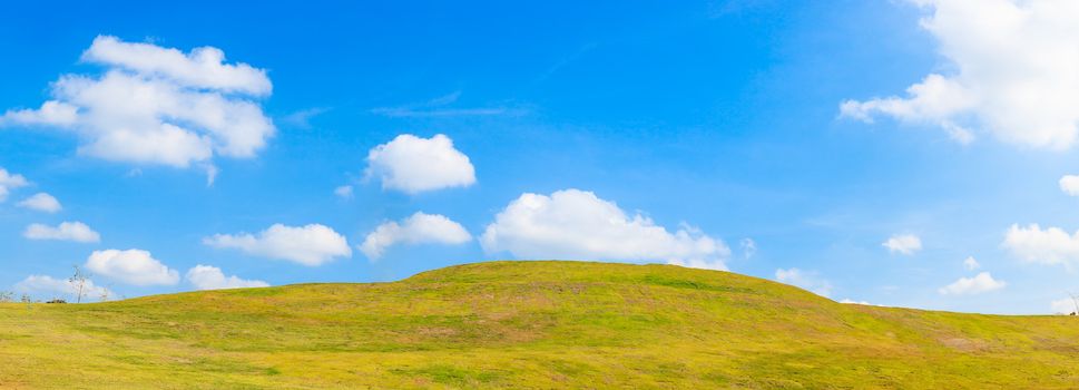 green hill summer landscape and blue sky panorama