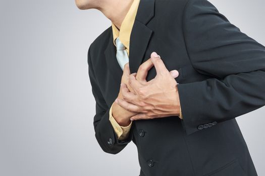 businessman having heart attack
