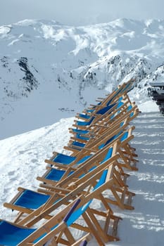 Deckchairs on Ofelerjoch peak in Austria nearby Kaltenbach in Zillertal valley