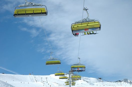 Kaltenbach, Austria - February 04: Ski lifts and unidentified skiers on Ofelerjoch nearby Kaltenbach in Zillertal in Austria