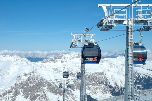 HINTERTUX, AUSTRIA - FEBRUARY 06: Peaks and ski lifts nearby Hintertux in Zillertal valley in Austria 06.02.2014