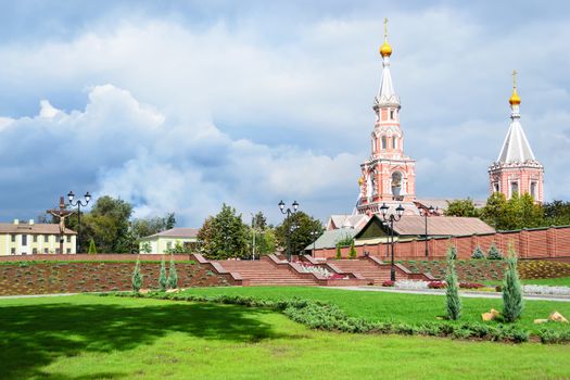 Christian church against the sky with dark clouds. Dniprodzerzhyns'k, Ukraine.