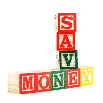 Construcrion from alphabet blocks "save money". Investment concept