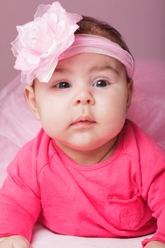 Three month old baby girl in pink tutu