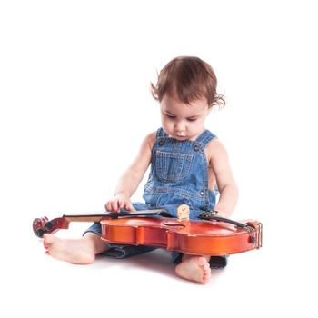 baby and violin isolated on white. Choosing future profession