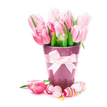 Tulips and eggs isolated on white. Easter decorations.