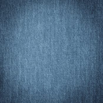 Texture of blue jeans textile close up