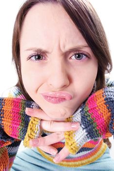 Distorted funny girl  face closeup in multicolored jacket