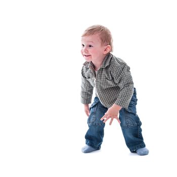 Cute playful one year toddler isolated on white background