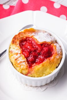 Cupcake with strawberry jam dip in heart shape