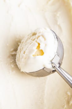 Ball of creamy ice cream in an scoop