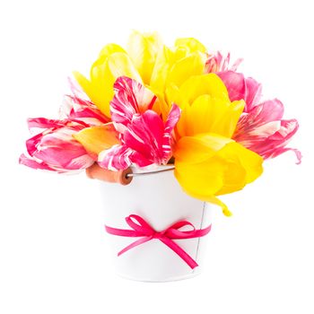 Bouquet from yellow and pink tulips  on white