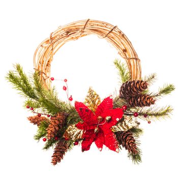 Christmas wreath with poinsettia and fir branches