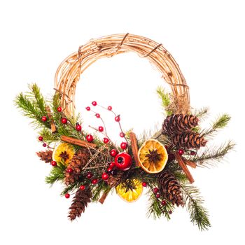 Christmas wreath with red berries and spices