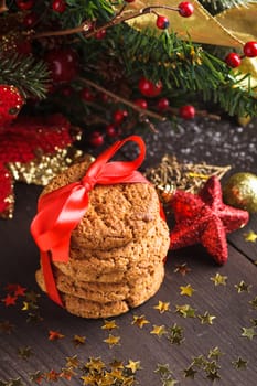 Christmas cookies on the table with red ribbon