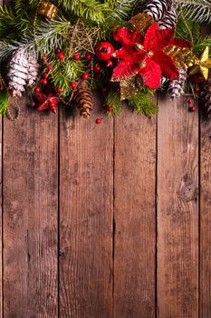 Christmas border design on the wooden background